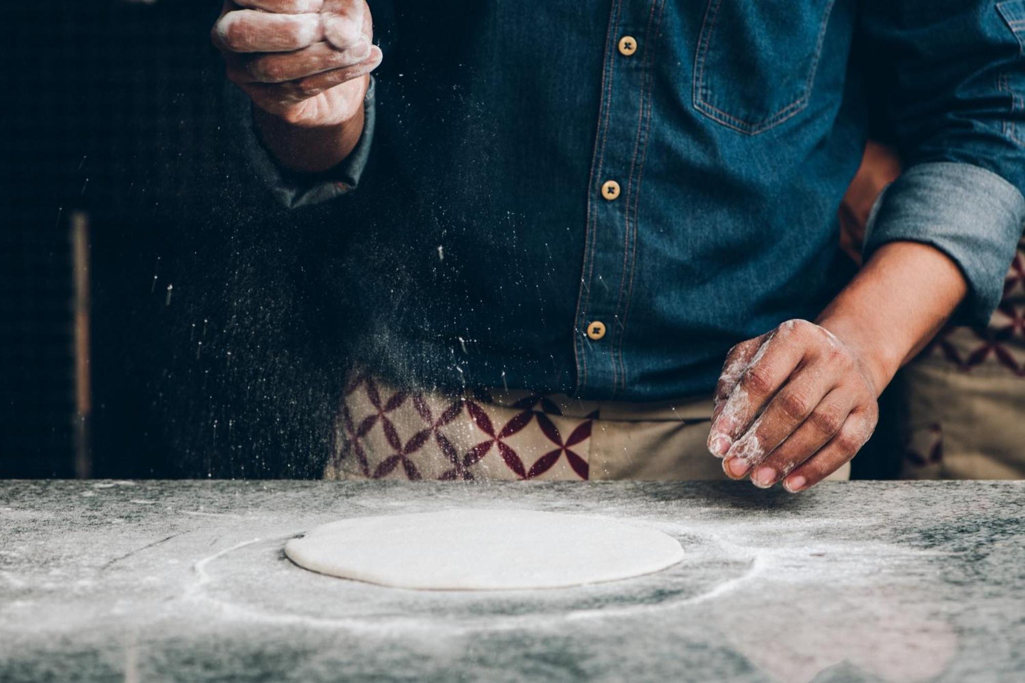 Hyatt Centric Candolim Goa Zewnętrze zdjęcie A baker preparing bread dough